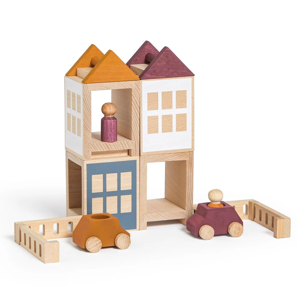 Wat gebeurt er als een kind niet alleen speelt, maar ook leert, bouwt én verhalen tot leven brengt? Dan heb je Lubu Town Maxi in handen. Deze houten speelset is niet zomaar speelgoed; het is een uitnodiging tot eindeloos ontdekken, fantaseren en creëren.