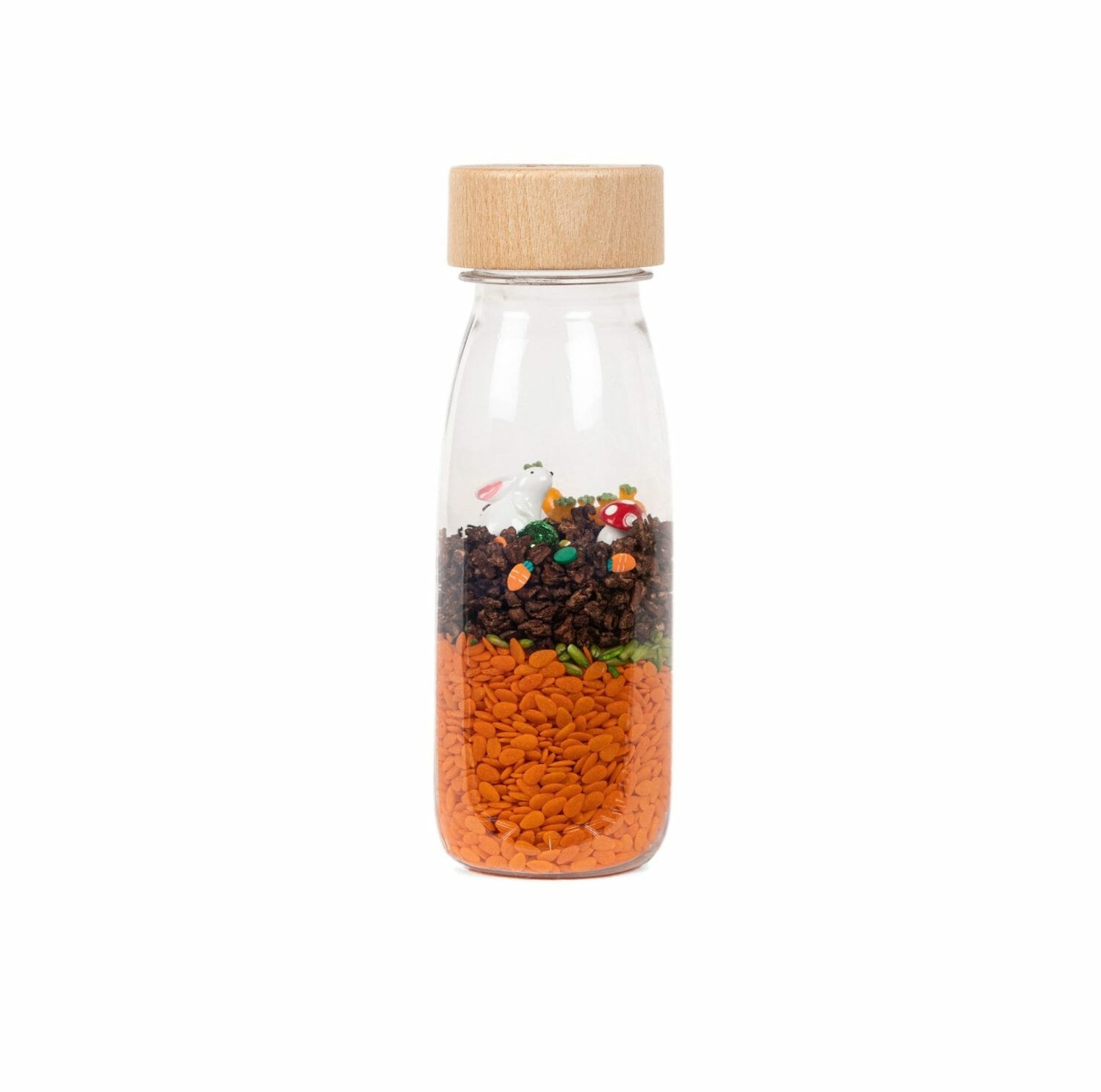 petit boum pasen is een sensorische fles in paasthema. Ga op zoek naar haas, eieren en wortelen.