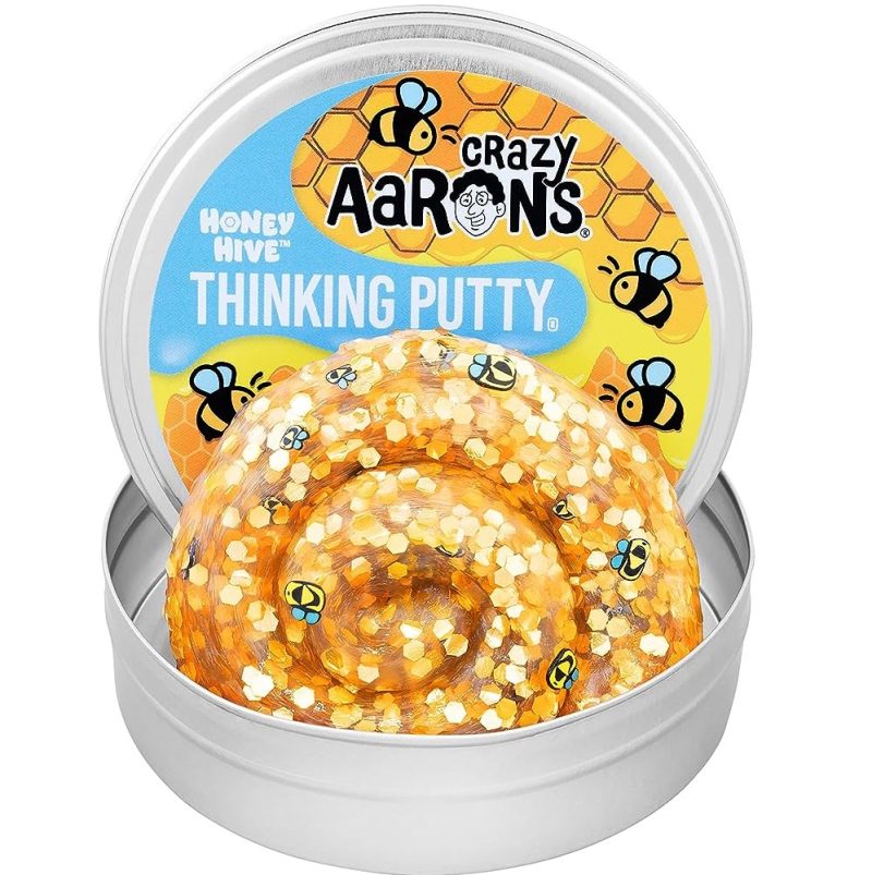 crazy aarons thinking putty honey hive, oogt als een goudkleurige putty gevuld met bijen. Het kneden met putty helpt ontspannen en concentreren