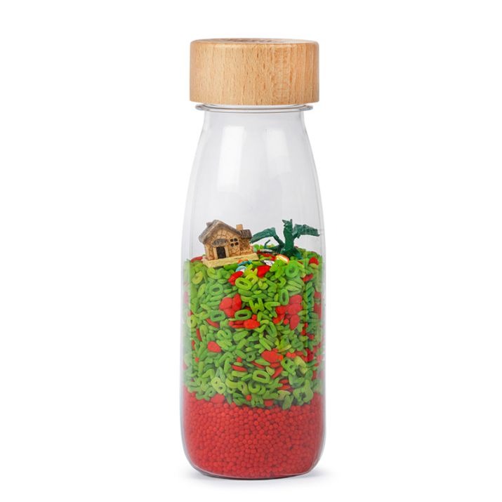 Petit boum sensorische fles draak stimuleert de zintuigen bij jong en oud, schud, kijk en luister